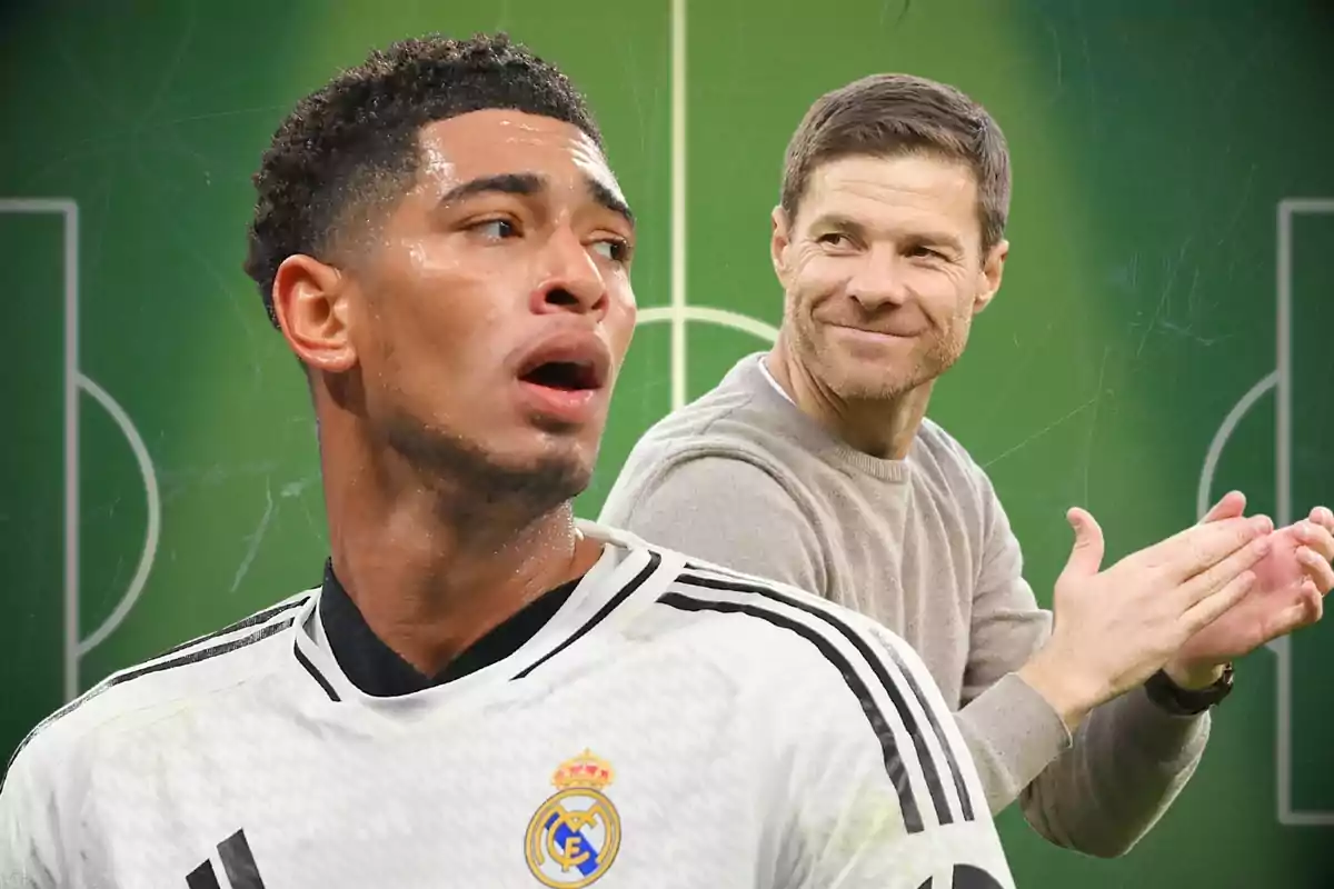 Futbolista del Real Madrid en primer plano con un entrenador aplaudiendo al fondo sobre un campo de fútbol verde