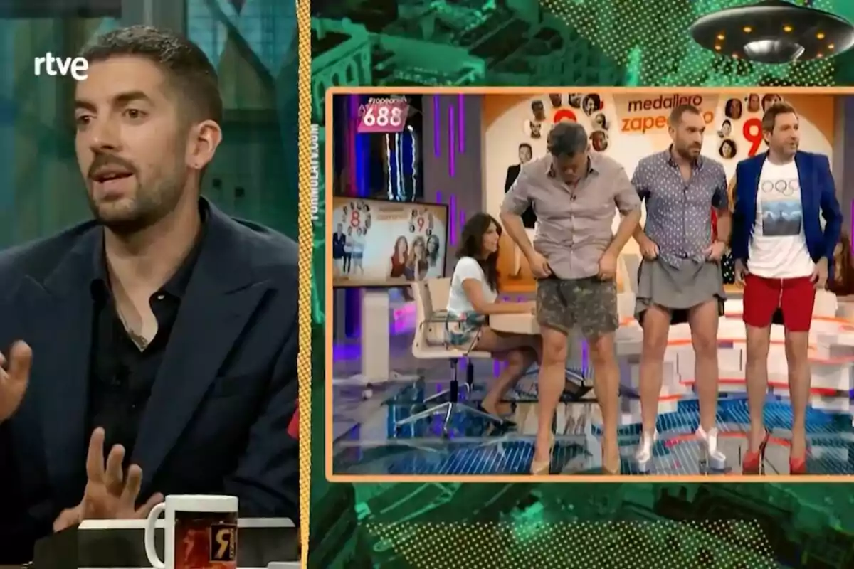 David Broncano con barba y chaqueta oscura habla en 'La Revuelta' mientras en una pantalla a su lado se muestra a tres hombres usando faldas y tacones junto a una mujer sentada en un set colorido David Broncano con barba y chaqueta oscura habla en 'La Revuelta' mientras en una pantalla a su lado se muestra a tres hombres usando faldas y tacones junto a una mujer sentada en un set colorido