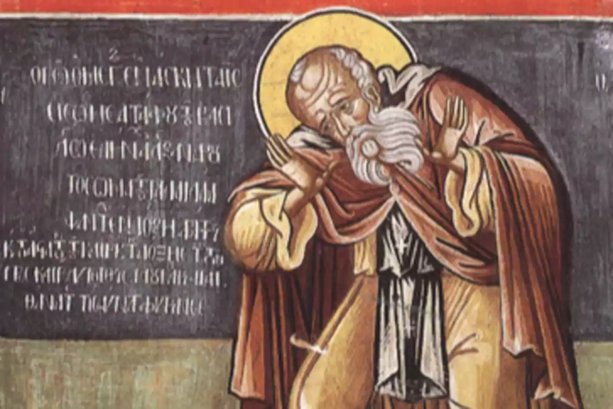 Pintura religiosa de un hombre anciano con barba blanca y halo dorado vestido con túnica marrón y fondo con inscripciones Pintura religiosa de un hombre anciano con barba blanca y halo dorado vestido con túnica marrón y fondo con inscripciones