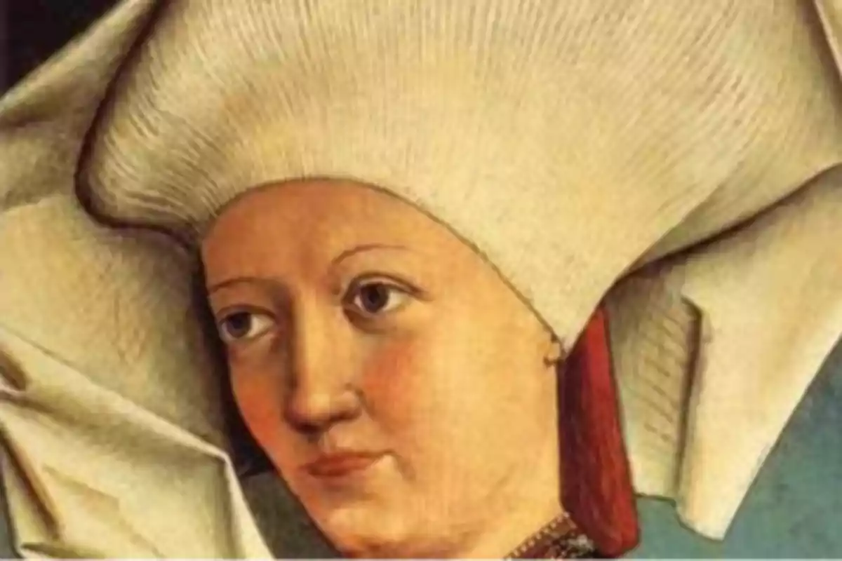 Retrato de una mujer con un tocado blanco grande y elaborado de estilo medieval Retrato de una mujer con un tocado blanco grande y elaborado de estilo medieval