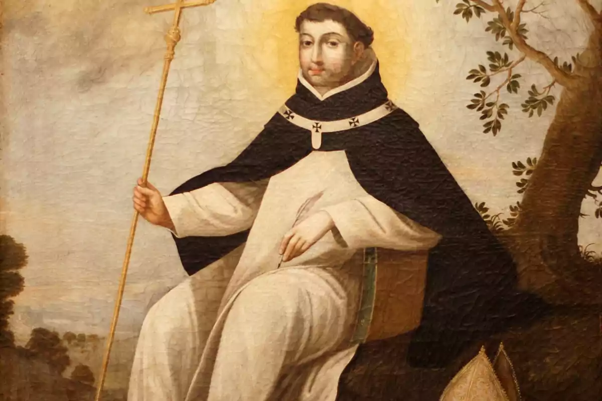 Pintura de un monje con hábito blanco y capa negra sentado bajo un árbol sosteniendo un báculo dorado Pintura de un monje con hábito blanco y capa negra sentado bajo un árbol sosteniendo un báculo dorado
