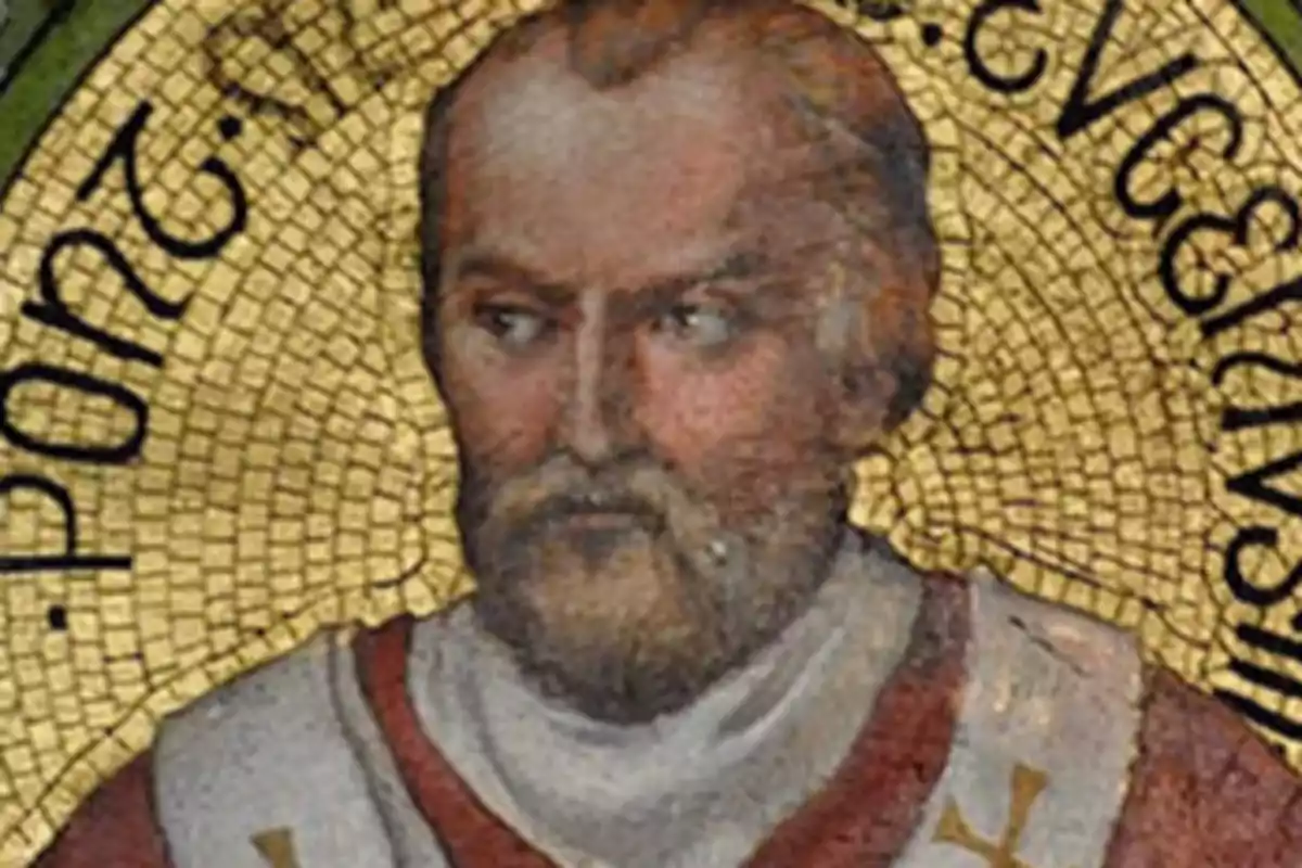 Retrato antiguo de un hombre con barba y vestimenta religiosa sobre un fondo dorado con letras negras Retrato antiguo de un hombre con barba y vestimenta religiosa sobre un fondo dorado con letras negras