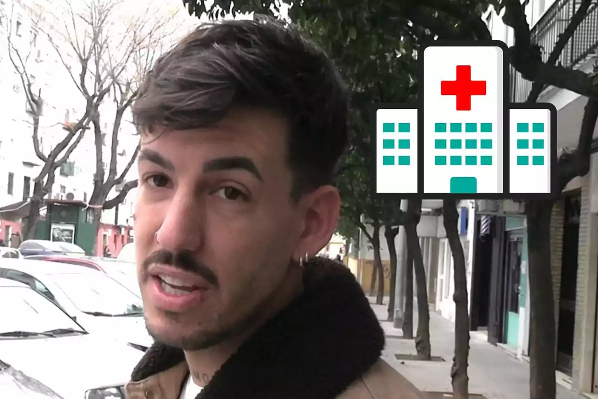 Luitingo joven con barba y pendiente caminando por una calle arbolada con un dibujo de hospital en la esquina superior derecha