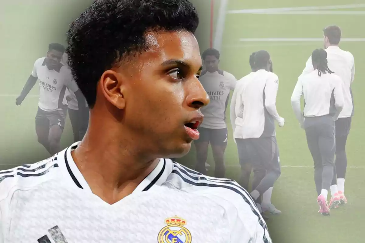 Jugador del Real Madrid en primer plano con expresión seria mientras de fondo se observa a varios compañeros entrenando en el campo