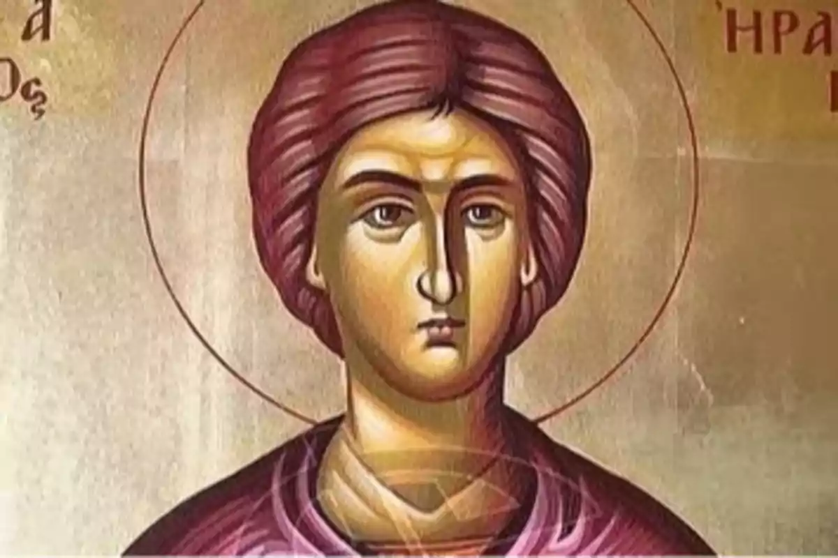 Pintura religiosa de estilo bizantino que muestra el rostro de una figura con aureola y cabello castaño oscuro peinado hacia atrás Pintura religiosa de estilo bizantino que muestra el rostro de una figura con aureola y cabello castaño oscuro peinado hacia atrás