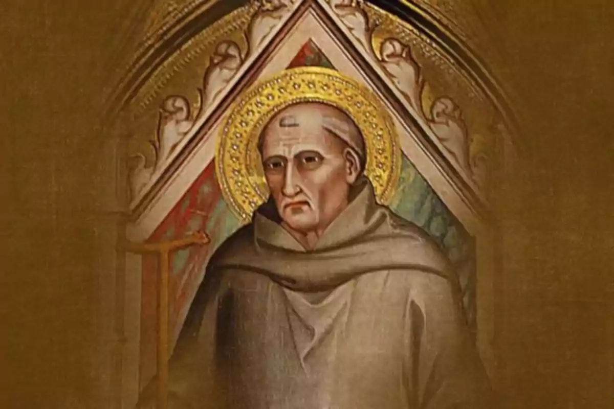 Pintura religiosa de un monje con aureola dorada y expresión seria, vestido con hábito marrón frente a un fondo decorativo. Pintura religiosa de un monje con aureola dorada y expresión seria, vestido con hábito marrón frente a un fondo decorativo.