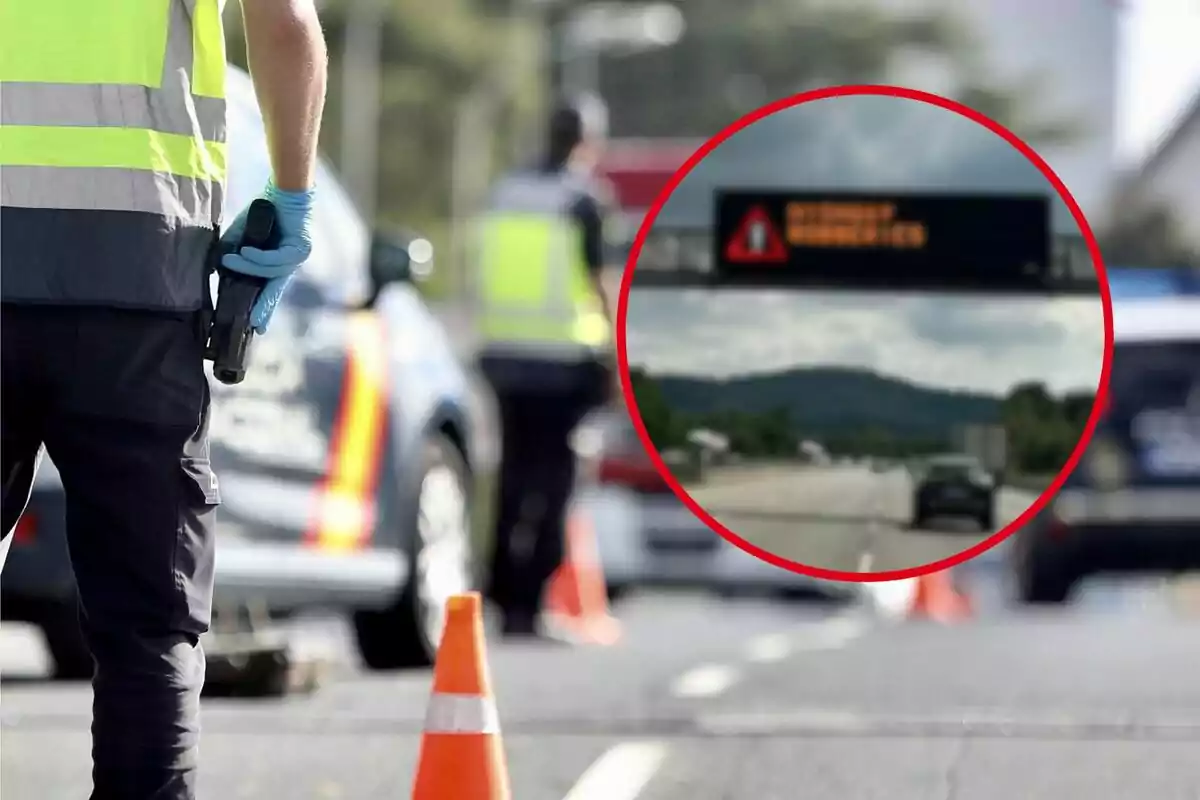 Un control policial en una carretera con un agente de policía en primer plano y un cartel de advertencia en la distancia.