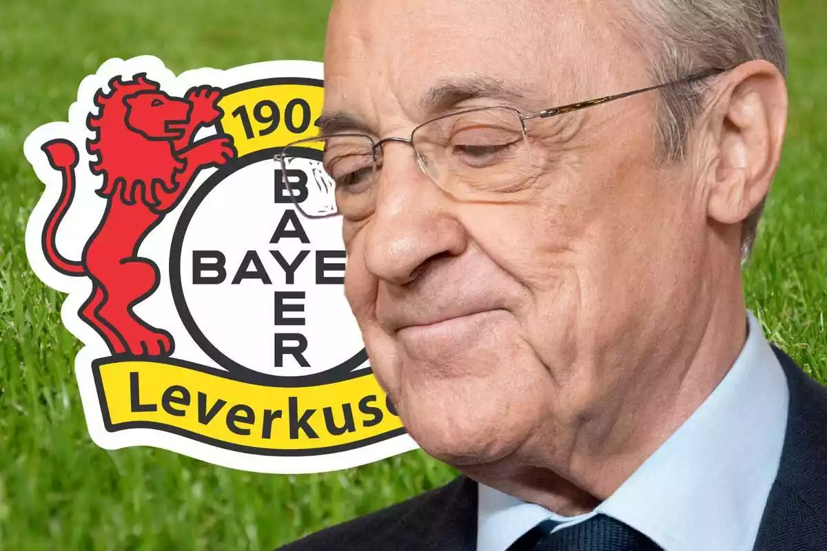 Florentino Pérez mirando al suelo con una media sonrisa al lado del escudo del Bayer Leverkusen