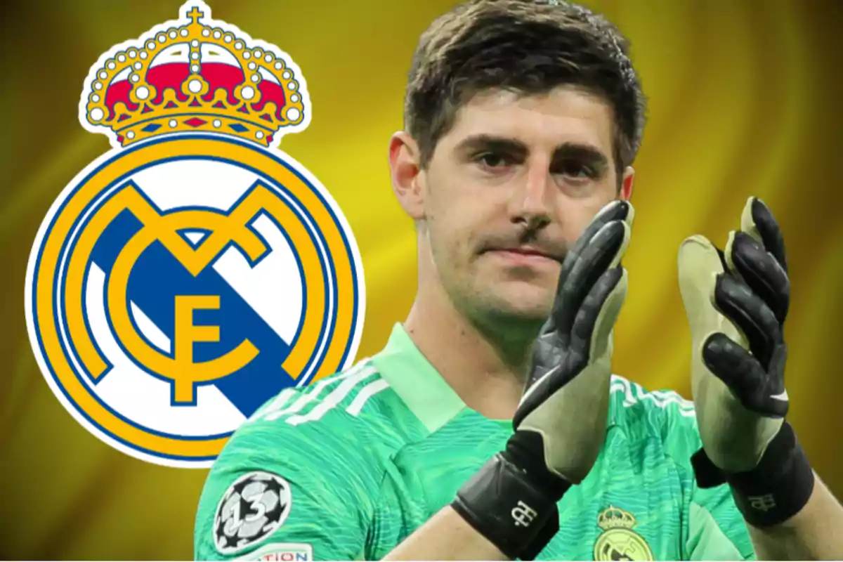 Un jugador de fútbol con uniforme verde aplaude frente al escudo del Real Madrid.