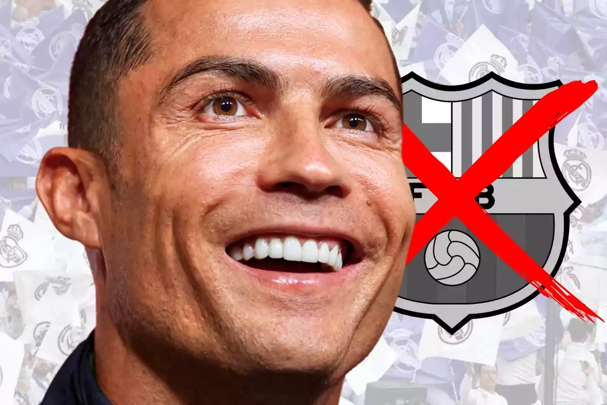 Hombre sonriente en primer plano con un escudo del FC Barcelona tachado al fondo y banderas del Real Madrid