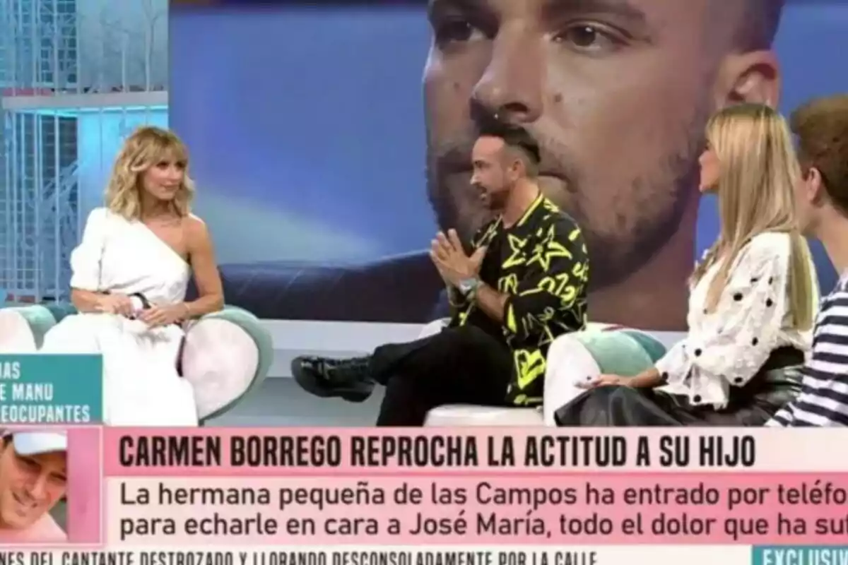 Un grupo de personas como Emma García o Luis Rollán está sentado en el plató de Fiesta, participando en un programa de entrevistas. En la pantalla se muestra un gran primer plano de José María Almoguera. En la parte inferior de la imagen hay un texto que menciona a Carmen Borrego y un reproche hacia su hijo. Un grupo de personas como Emma García o Luis Rollán está sentado en el plató de Fiesta, participando en un programa de entrevistas. En la pantalla se muestra un gran primer plano de José María Almoguera. En la parte inferior de la imagen hay un texto que menciona a Carmen Borrego y un reproche hacia su hijo.