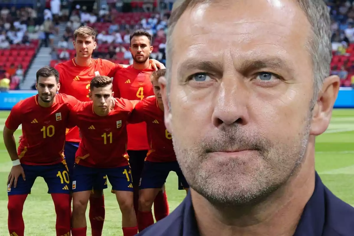 Un grupo de jugadores de fútbol con uniformes rojos y un hombre en primer plano con expresión seria.