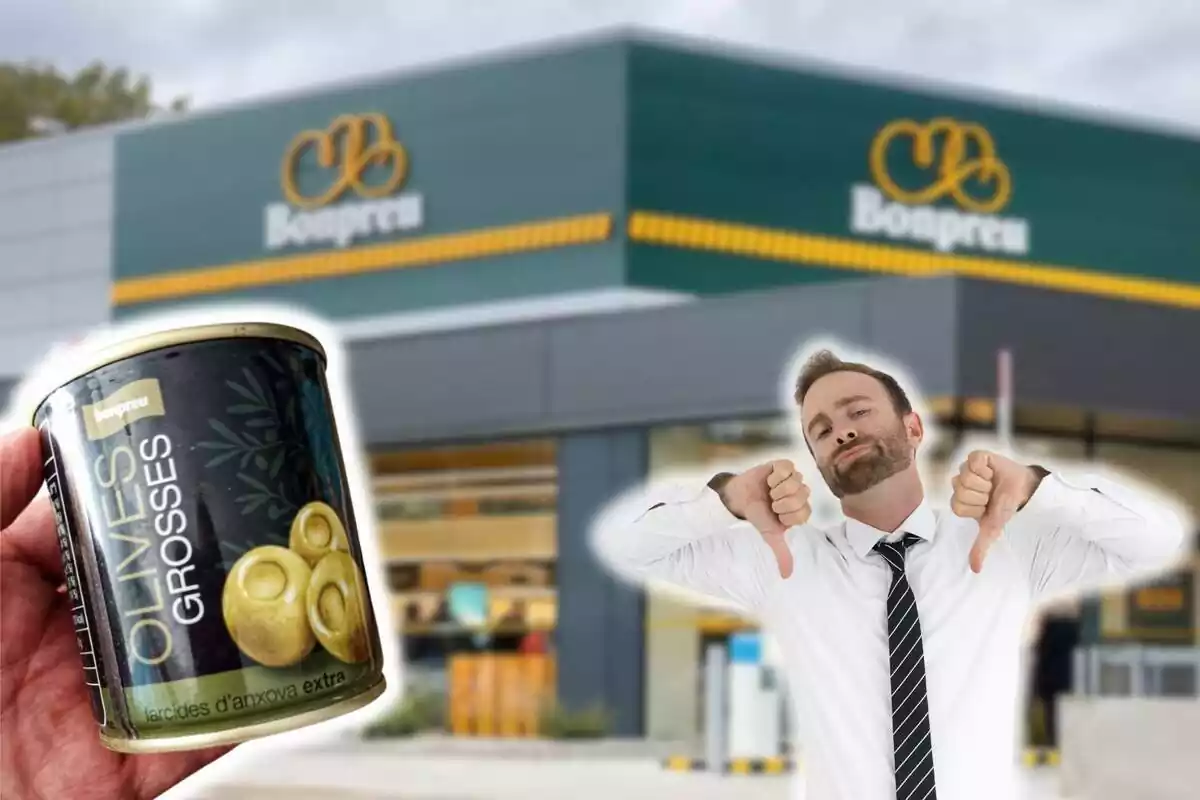 Fotomontaje de un supermercado Bonpreu de fondo y al frente una lata de aceitunas marca Bonpreu y un hombre decepcionado con los pulgares abajo