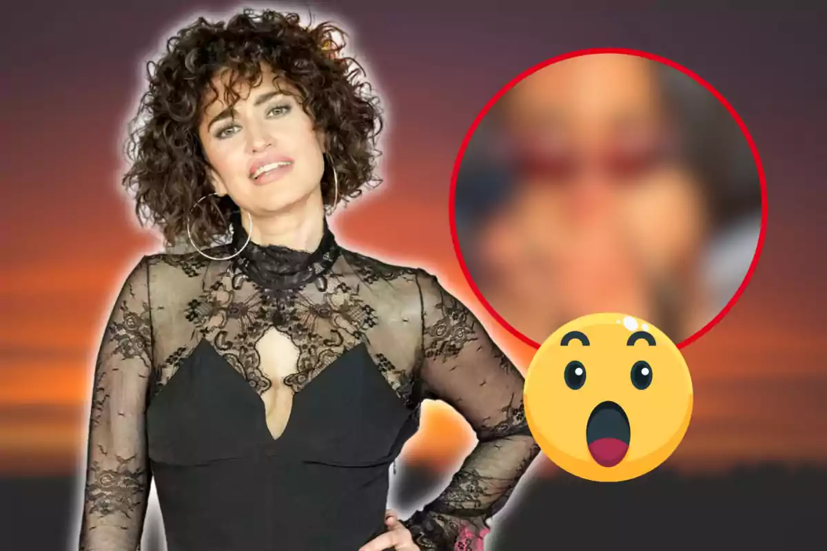 Una mujer con cabello rizado y vestido negro de encaje posa frente a un fondo de atardecer, mientras que en la esquina inferior derecha hay un emoji sorprendido y un círculo rojo con una imagen borrosa dentro.