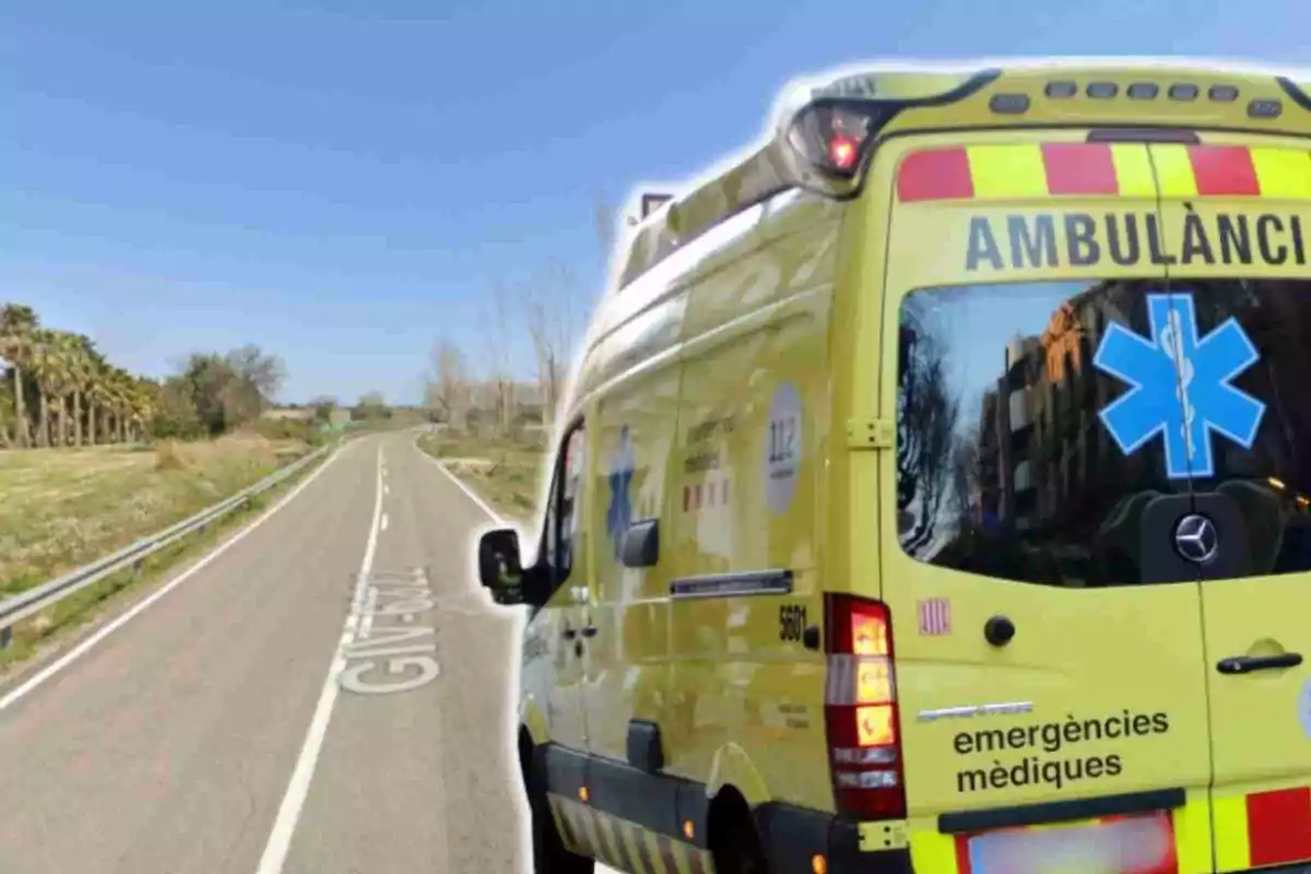 Una ambulancia amarilla en una carretera rural bajo un cielo despejado.