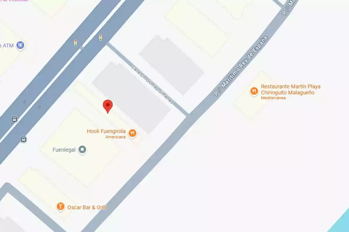 Mapa de una zona en Fuengirola donde se muestran ubicaciones de restaurantes y negocios como Hook Fuengirola, Restaurante Martín Playa, Oscar Bar & Grill y Fuenlegal, junto a las calles Paseo Marítimo Rey de España y Calle Dr. Gómez Jiménez. Mapa de una zona en Fuengirola donde se muestran ubicaciones de restaurantes y negocios como Hook Fuengirola, Restaurante Martín Playa, Oscar Bar & Grill y Fuenlegal, junto a las calles Paseo Marítimo Rey de España y Calle Dr. Gómez Jiménez.