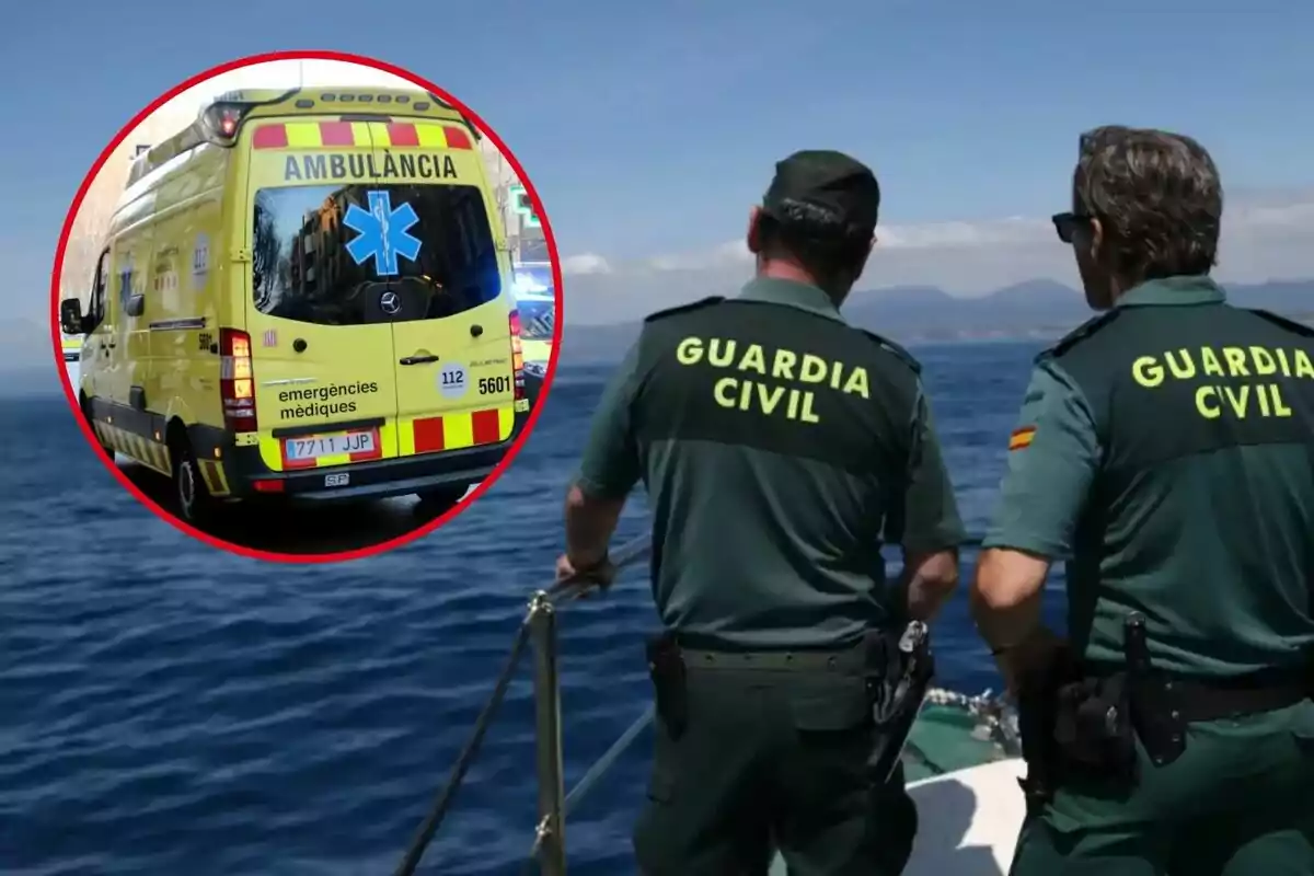 Dos agentes de la Guardia Civil observan el mar desde una embarcación con una imagen insertada de una ambulancia amarilla en un círculo rojo.