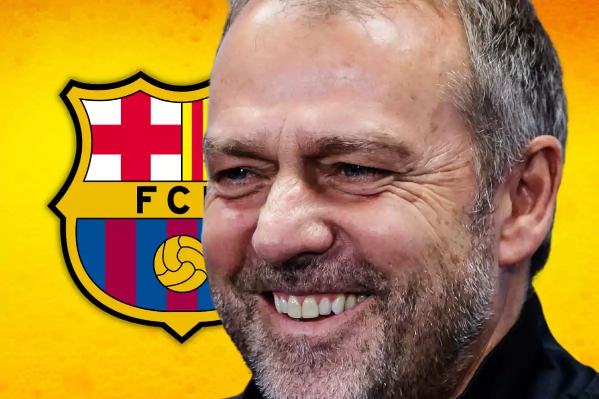 Un hombre sonriente con barba frente al escudo del FC Barcelona sobre un fondo amarillo.