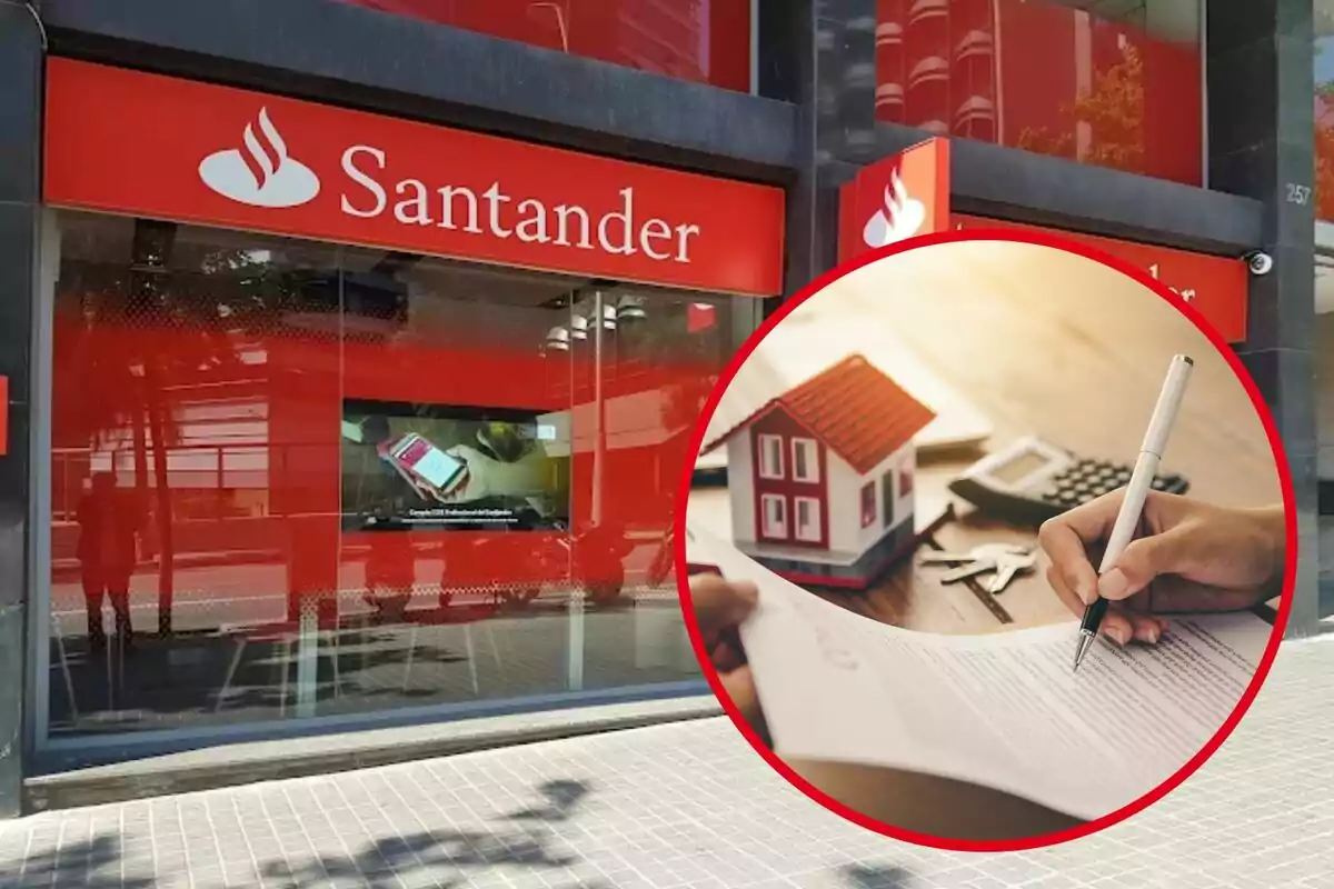 Fachada de una sucursal del banco Santander con un recuadro que muestra una mano firmando un documento junto a una casa en miniatura, una calculadora y unas llaves.