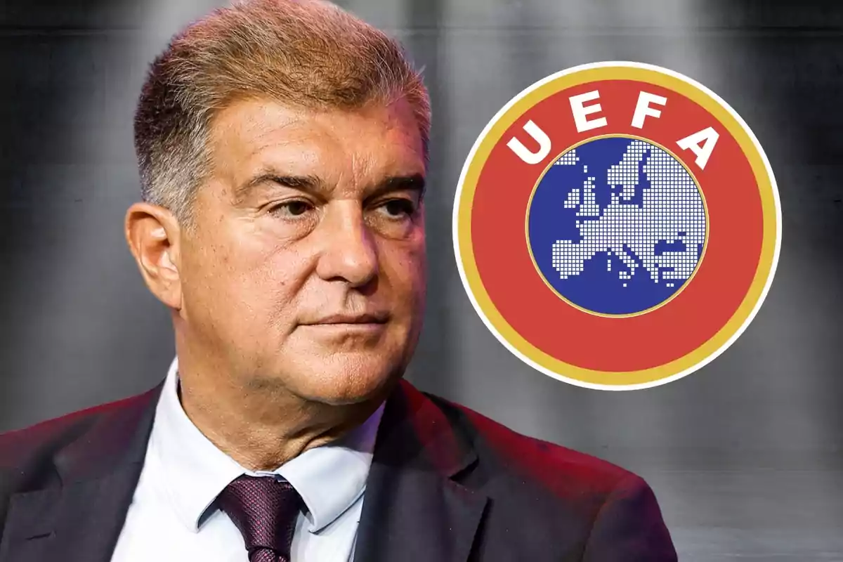 Hombre de traje con expresión seria y el logo de la UEFA al fondo