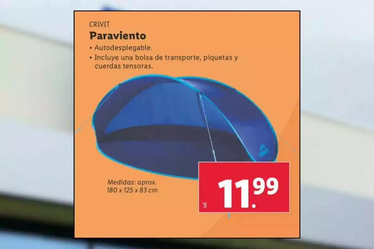 Imagen de un paraviento azul autodesplegable de la marca Crivit con precio de 11.99 euros y medidas aproximadas de 180 por 125 por 83 centímetros, incluye bolsa de transporte, piquetas y cuerdas tensoras Imagen de un paraviento azul autodesplegable de la marca Crivit con precio de 11.99 euros y medidas aproximadas de 180 por 125 por 83 centímetros, incluye bolsa de transporte, piquetas y cuerdas tensoras