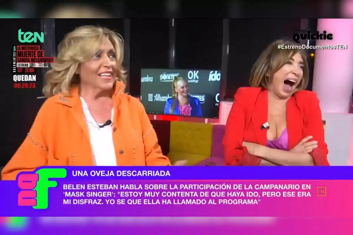 Lydia Lozano y María Patiño en el plató de un programa de televisión, una con chaqueta naranja y otra con chaqueta roja, están riendo mientras en el fondo se ve una pantalla con otra mujer. En la esquina superior izquierda aparece el logo del canal TEN y un anuncio sobre un documental. En la parte inferior hay un texto sobre la participación de Belén Esteban en 'Mask Singer'. Lydia Lozano y María Patiño en el plató de un programa de televisión, una con chaqueta naranja y otra con chaqueta roja, están riendo mientras en el fondo se ve una pantalla con otra mujer. En la esquina superior izquierda aparece el logo del canal TEN y un anuncio sobre un documental. En la parte inferior hay un texto sobre la participación de Belén Esteban en 'Mask Singer'.