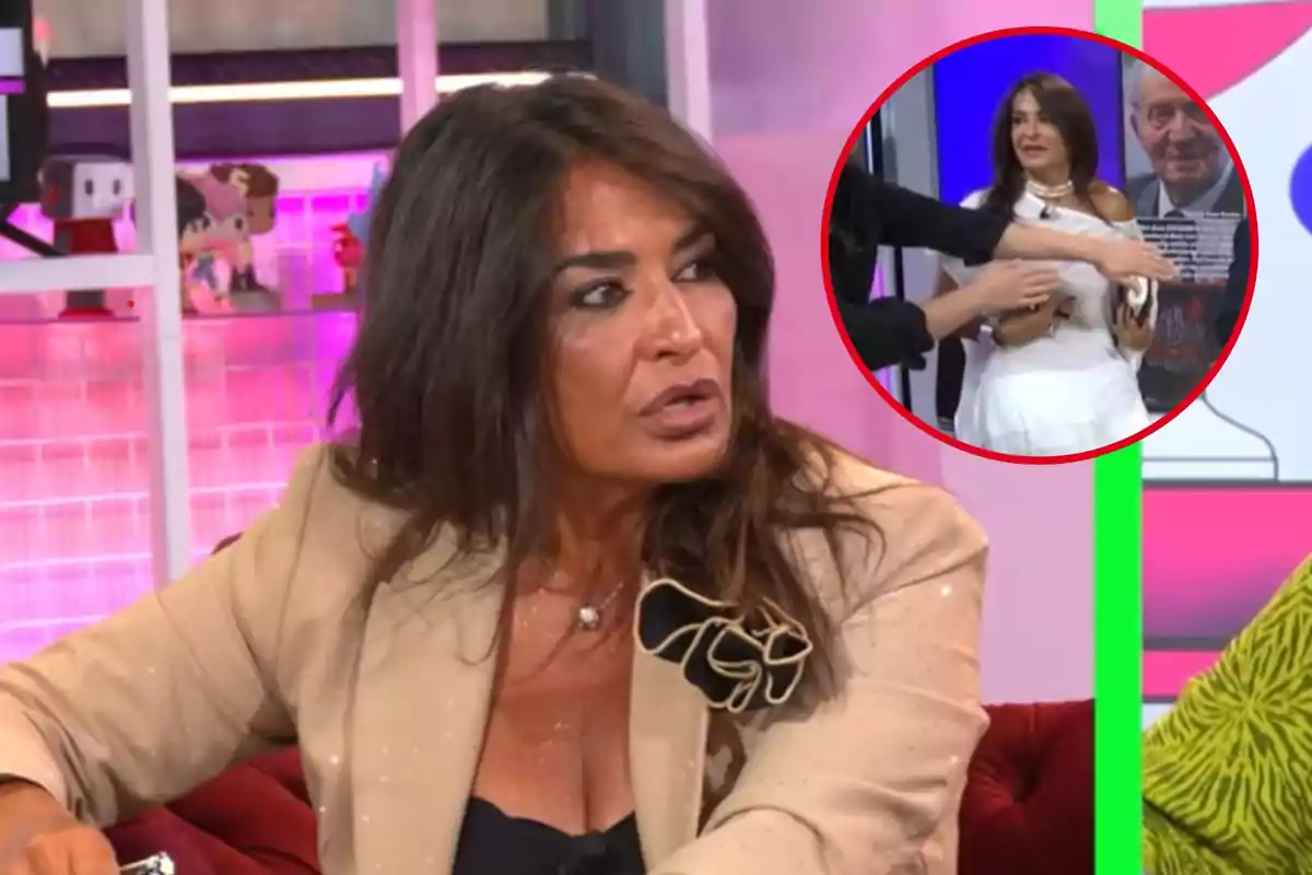 Aida Nízar con cabello largo y oscuro, vestida con un blazer beige y una blusa negra, está sentada en un set de televisión con luces rosadas de fondo; en la esquina superior derecha de la imagen hay un recuadro circular que muestra a la misma mujer en otra situación, aparentemente siendo asistida por alguien.