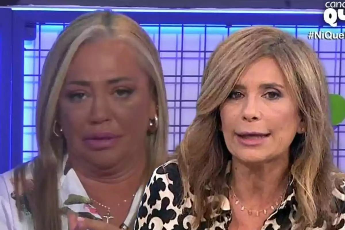 Belén Esteban y Gema López en un sus programa de televisión con fondo azul y rejilla.