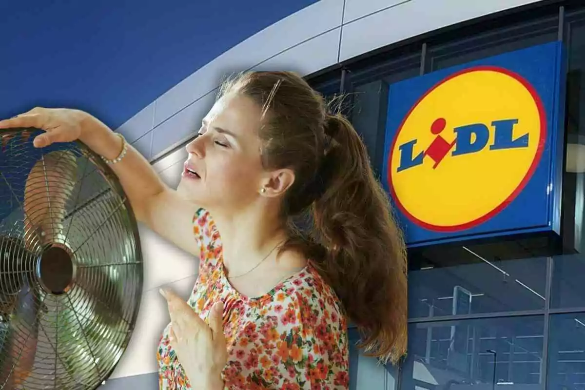Mujer disfrutando el aire de un ventilador frente a una tienda Lidl