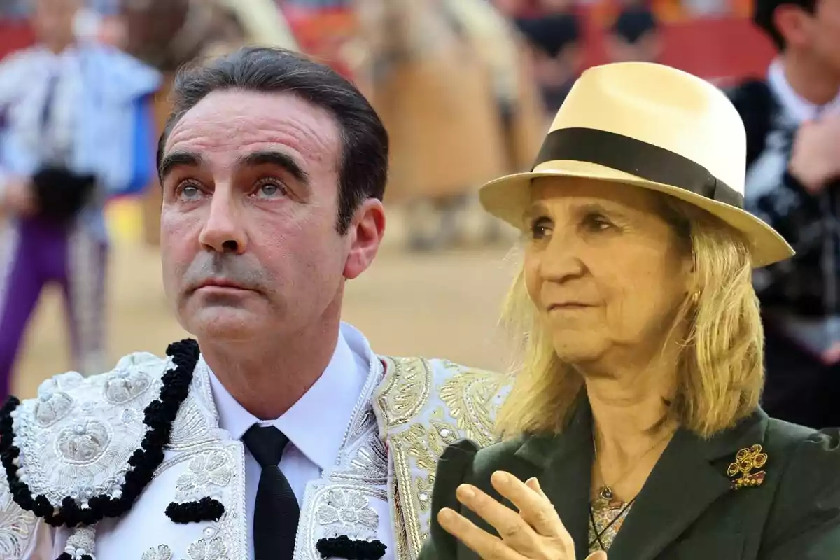 Enrique Ponce vestido con traje de luces junto a la infanta Elena con sombrero en una plaza de toros.