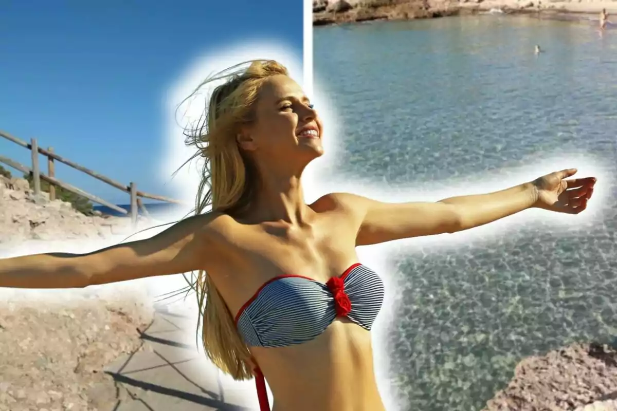 Mujer en bikini disfrutando del sol con los brazos extendidos frente a un paisaje de playa y mar ubicado en Cala Vidre, en l'Ametlla de Mar.