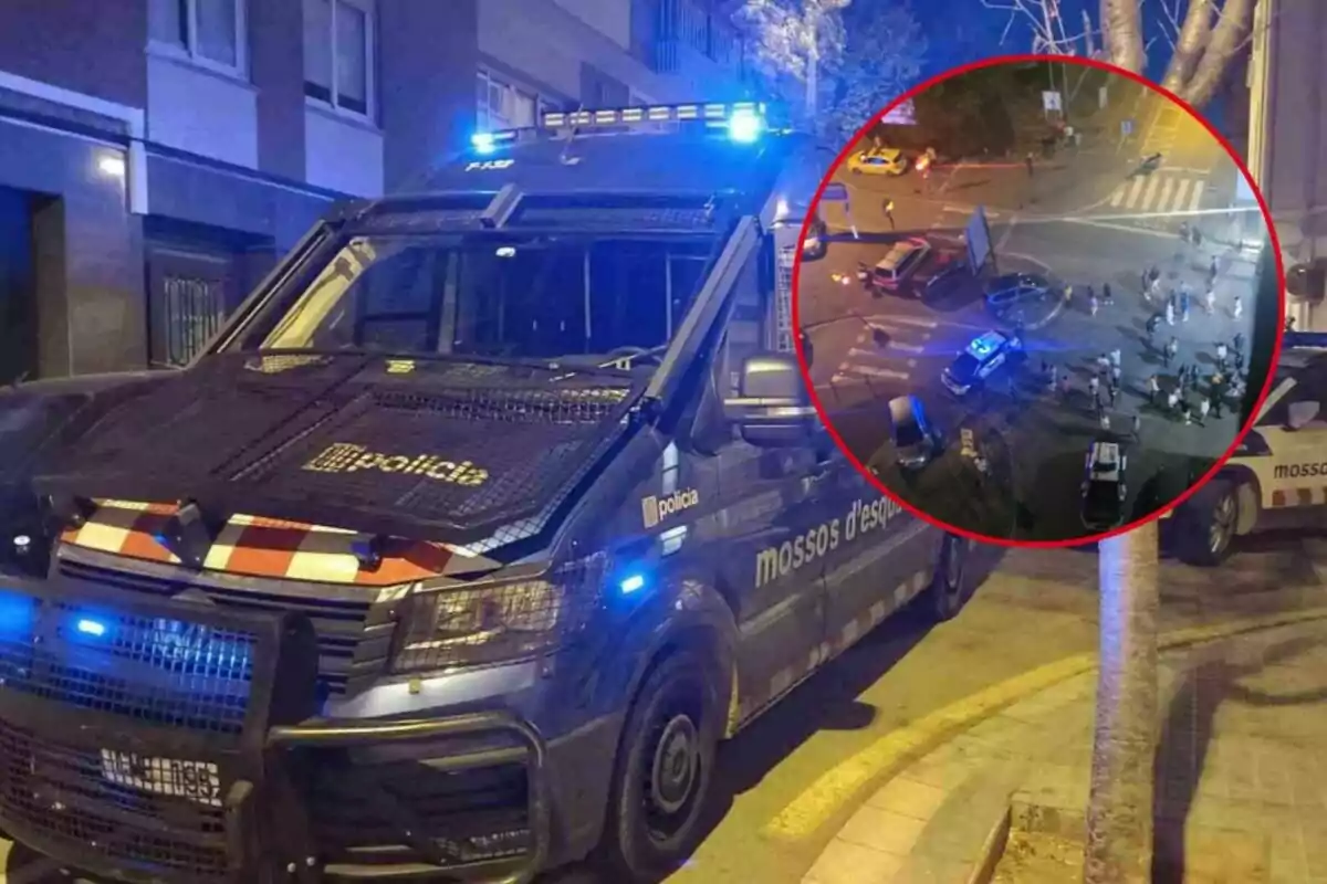 Vehículo de los Mossos d'Esquadra con luces encendidas y una escena de intervención policial en una rotonda.