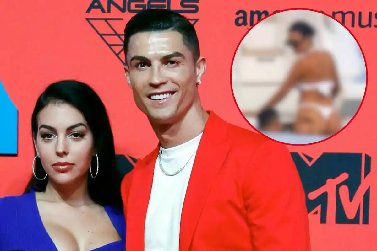 Georgina Rodríguez.y Cristiano Ronaldo posando en un evento con un fondo rojo y un logotipo de MTV.