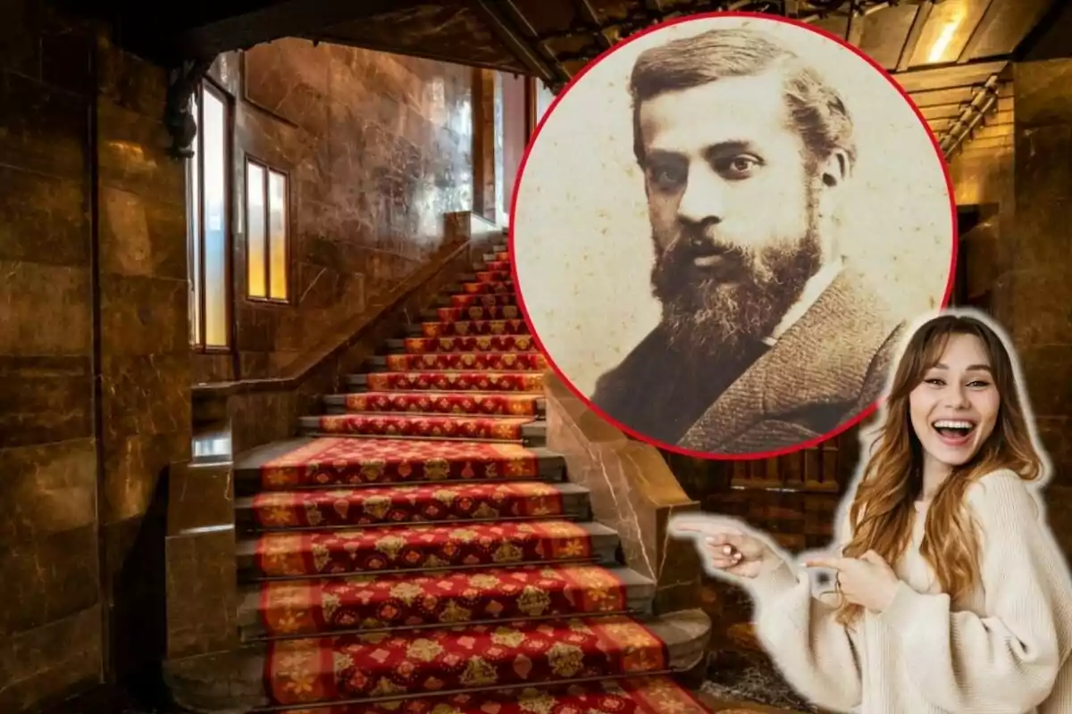 Una mujer sonriente señala hacia una imagen en blanco y negro de un hombre con barba, superpuesta sobre una escalera alfombrada en un edificio de estilo antiguo.