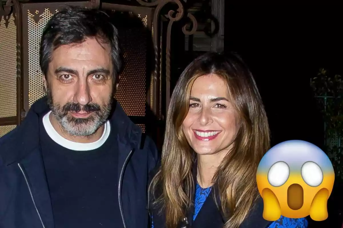 Juan del Val y Nuria Roca sonrientes posando para una foto con un emoji de sorpresa en la esquina inferior derecha.