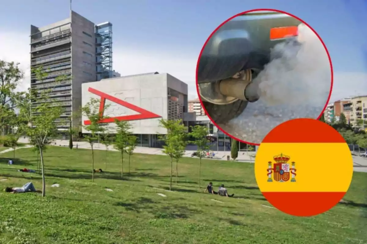 Edificio moderno con un parque en primer plano, un círculo con una imagen de un tubo de escape emitiendo humo y la bandera de España.