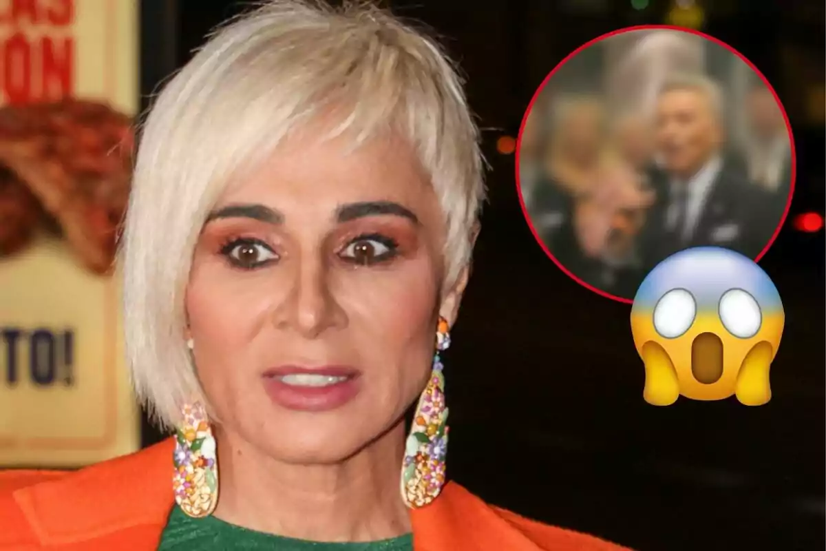 Ana María Aldón con cabello rubio corto y aretes coloridos aparece en primer plano con una expresión de sorpresa mientras en el fondo se ve una imagen borrosa dentro de un círculo rojo y un emoji de cara sorprendida.