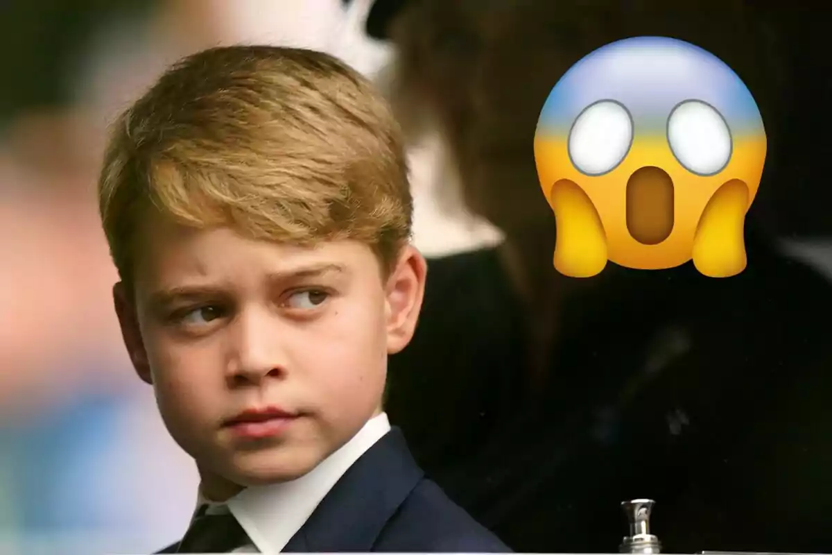 El príncipe George con expresión seria junto a un emoji sorprendido.