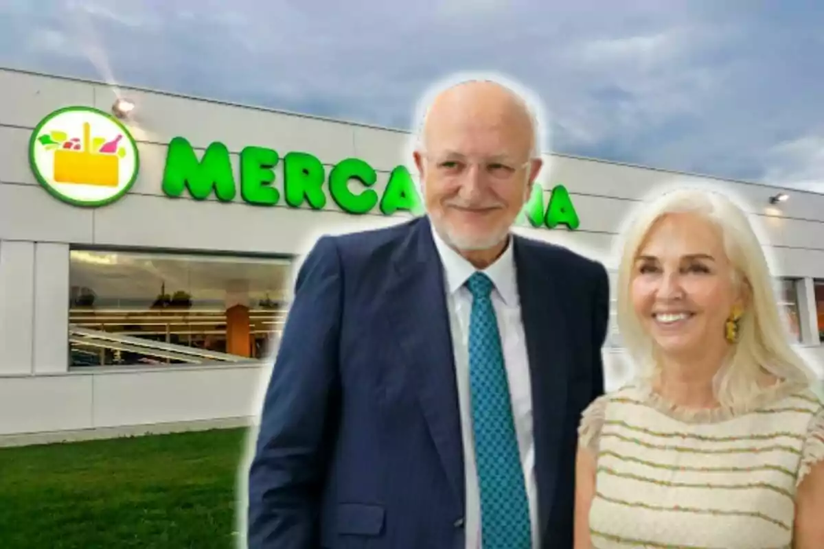 Juan Roig y Hortensia Herrero sonriente frente a un supermercado Mercadona.