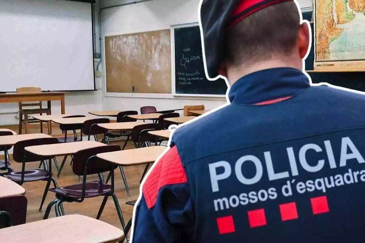 Imagen en la que se puede ver a un agente de los Mossos d'Esquadra de espaldas junto a una escuela