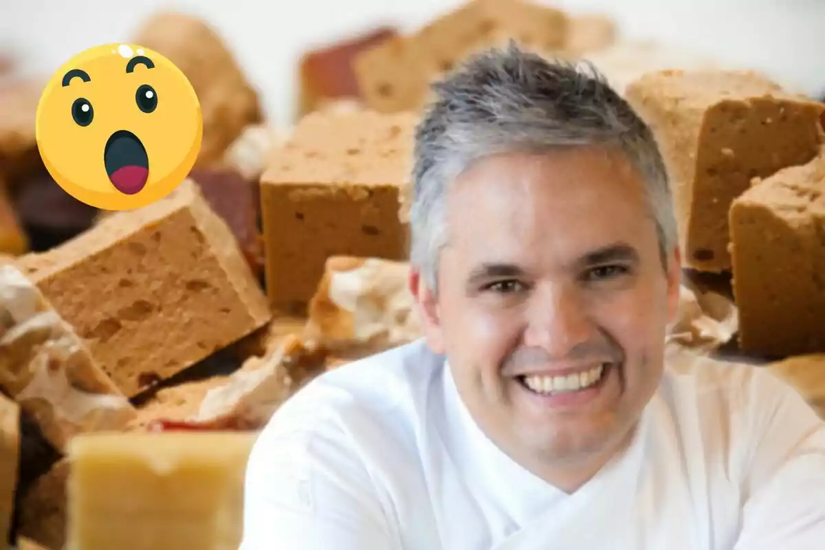 Un hombre sonriente con cabello canoso y una chaqueta blanca está frente a una pila de turrones con un emoji sorprendido en la esquina superior izquierda.