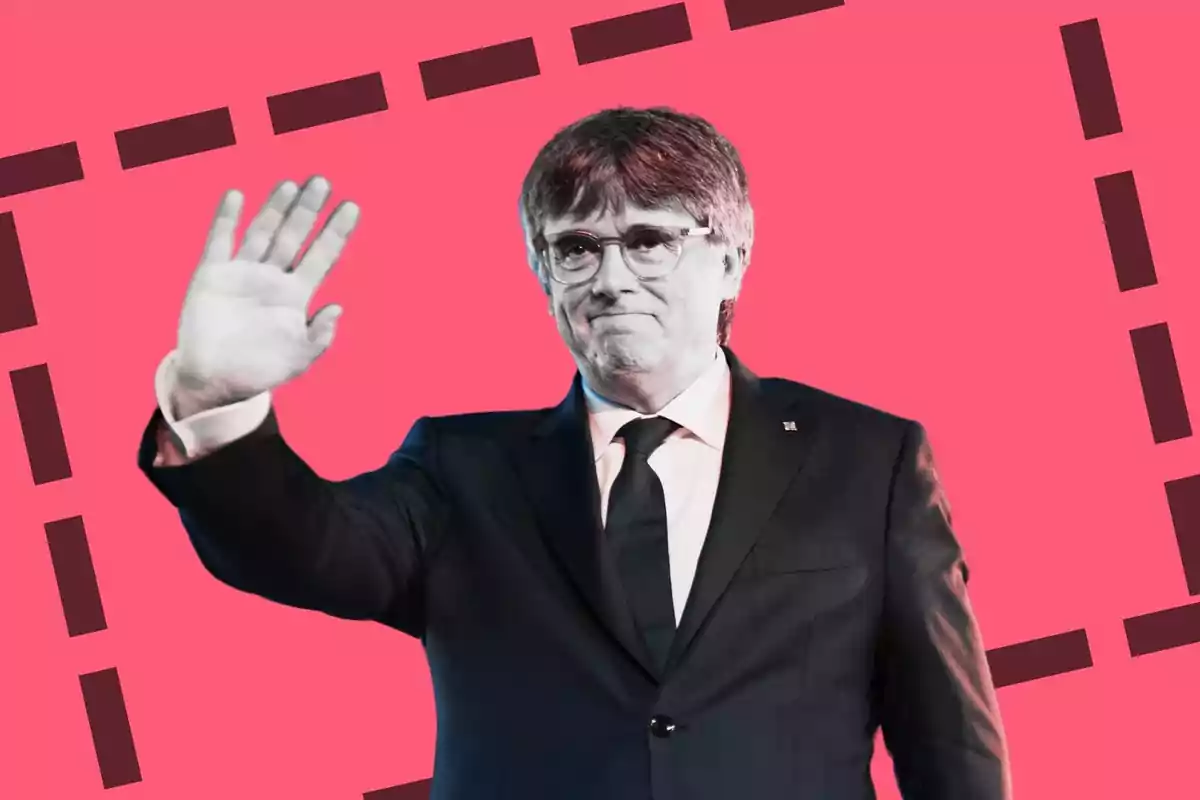 Carles Puigdemont saludando con la mano extendida