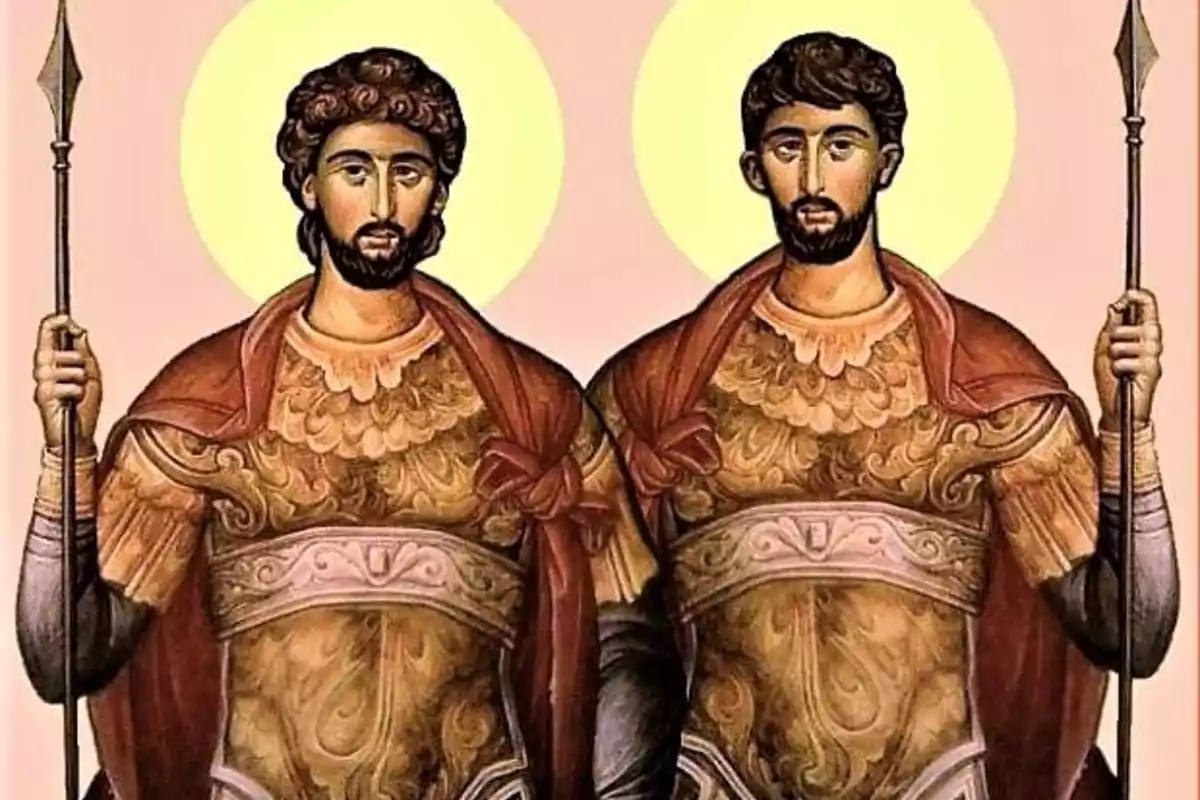 Imagen de dos figuras religiosas con aureolas, vestidas con armaduras y capas rojas, sosteniendo lanzas.