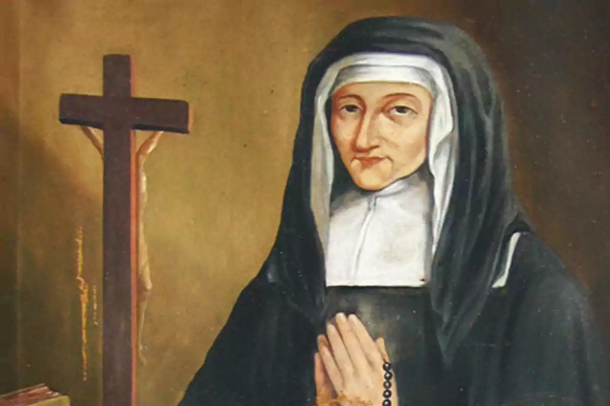 Una pintura de una monja con hábito negro y blanco rezando frente a un crucifijo. Una pintura de una monja con hábito negro y blanco rezando frente a un crucifijo.