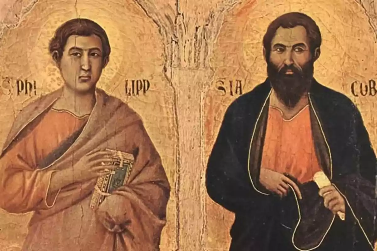 Dos figuras religiosas en un ícono antiguo, una sosteniendo un libro y la otra un pergamino, con halos dorados sobre sus cabezas.