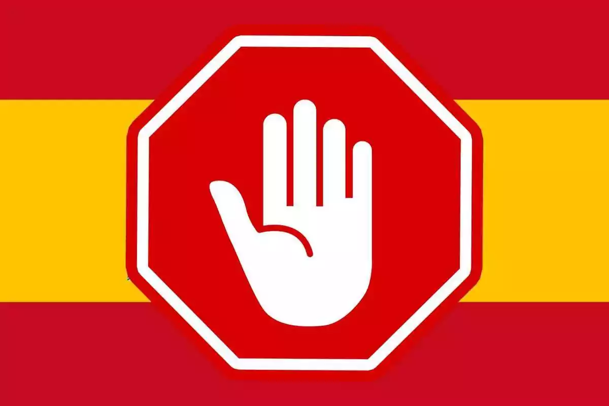 Montaje con la bandera de España y una señal de stop