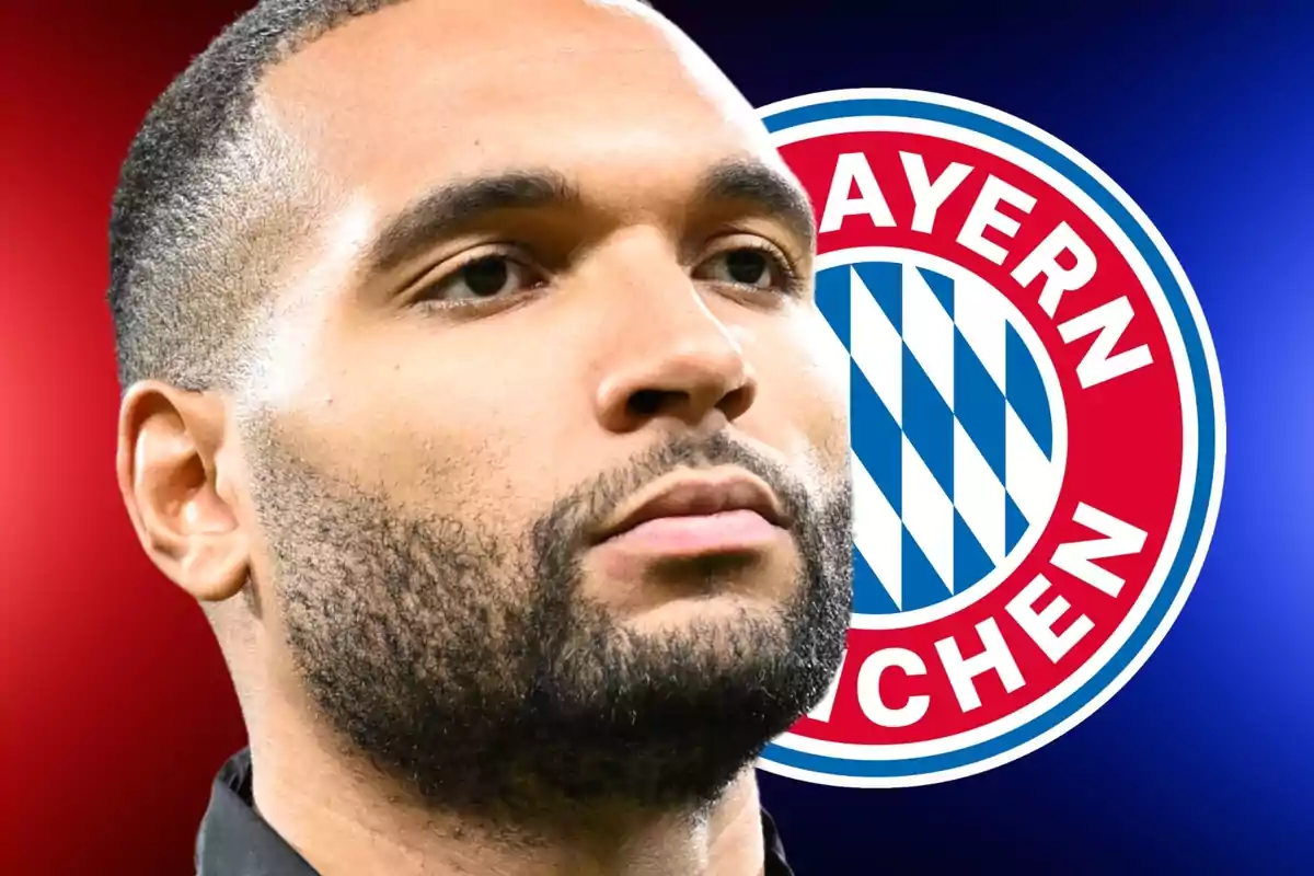 Un hombre con barba frente al logo del Bayern de Múnich.