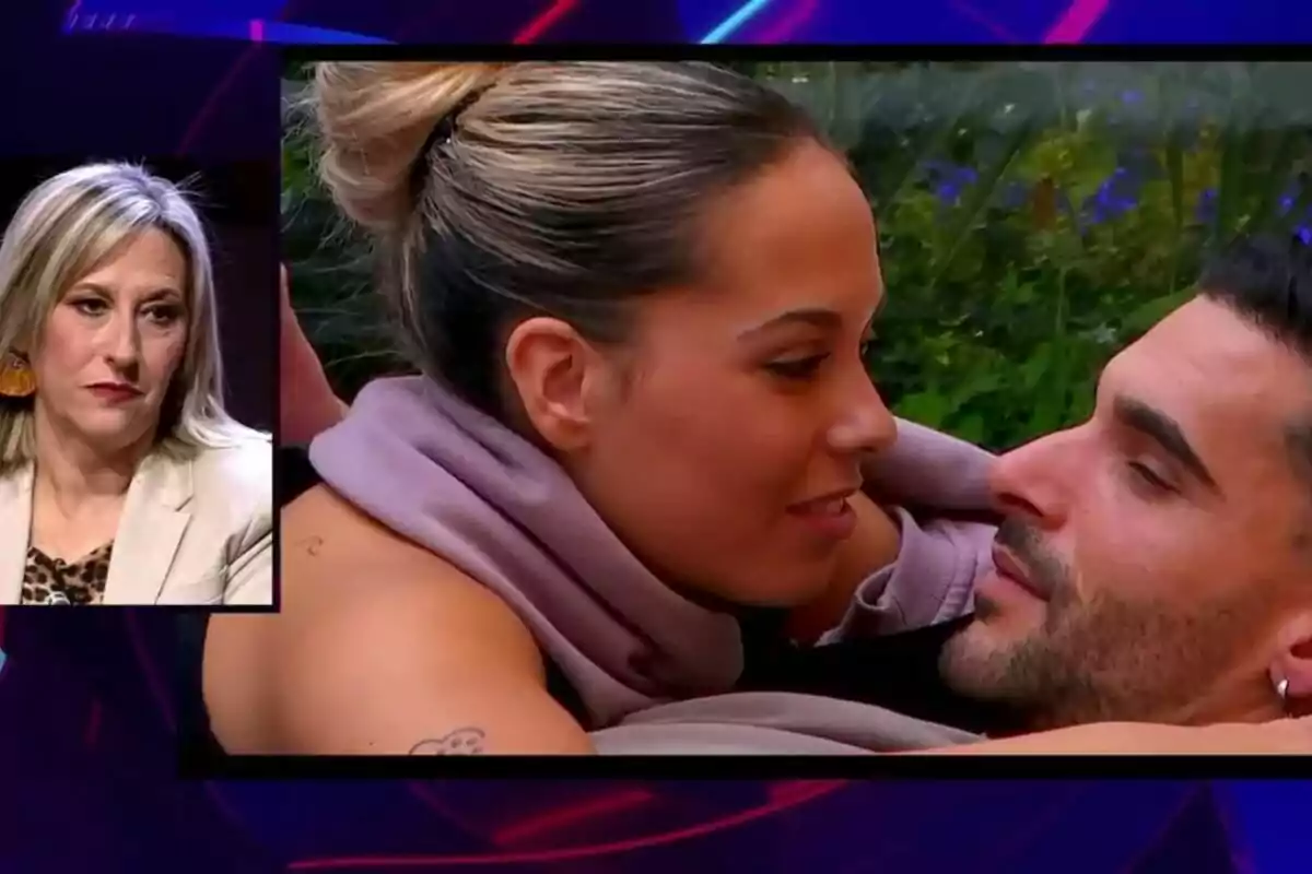 Laura observa una escena romántica en la que Edi y Violeta se mira fijamente mientras están recostados en un entorno al aire libre en Gran Hermano.